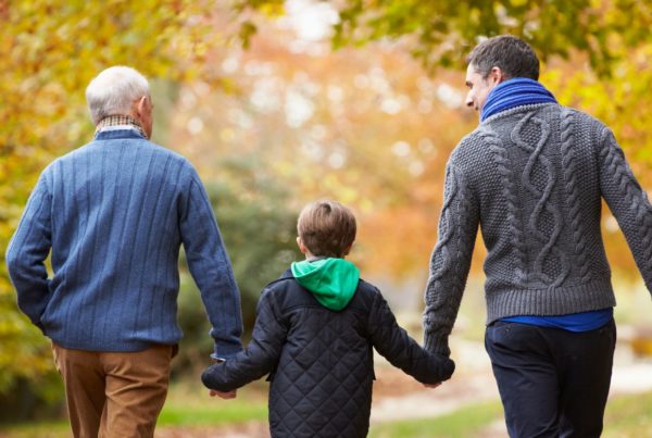 three generations of a family out walking