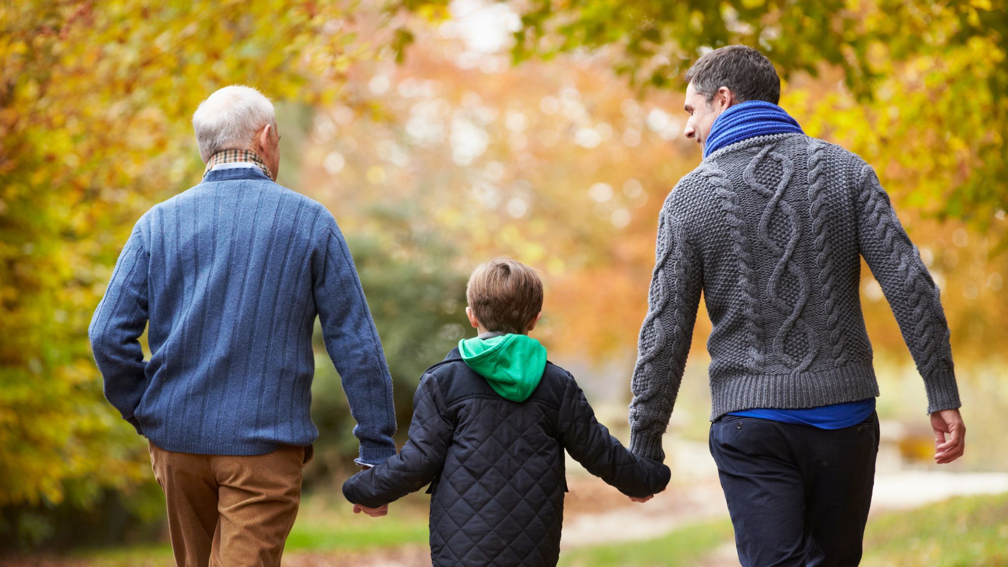 three generations of a family out walking