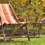 Deckchair with plantpot on table